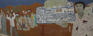 Mural no campo de Aida, na Palestina, mostra o documento de identidade dos refugiados / Foto: Moara Crivelente